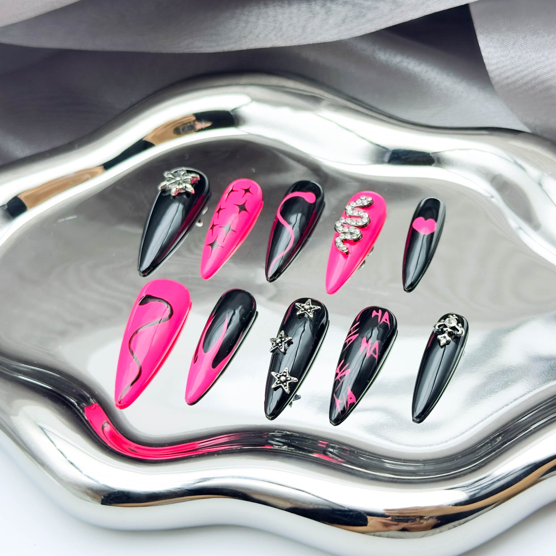 Hot Contrast: Pink and Black Stiletto Press-On Nails with Daring Embellishments